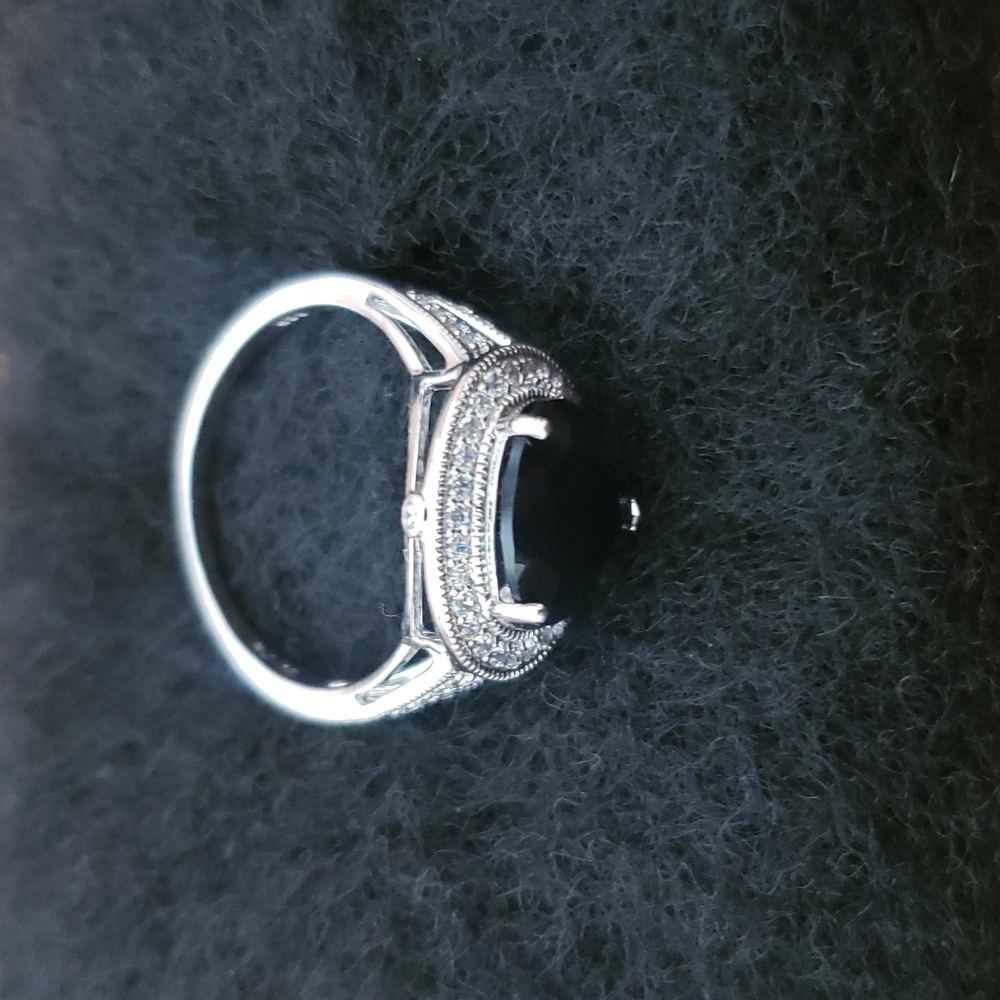 STERLING SILVER WITH BLACK DIAMOND AND SMALL WHITE DIAMONDS